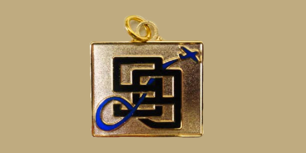 A close up view of the charm with the numerical 99s logo