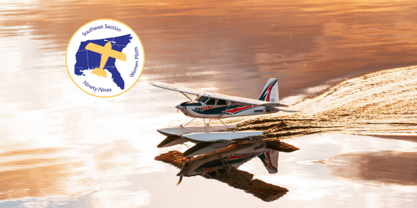 Seaplane landing with the sunset reflecting on the water and the Southeast Section logo in the top left